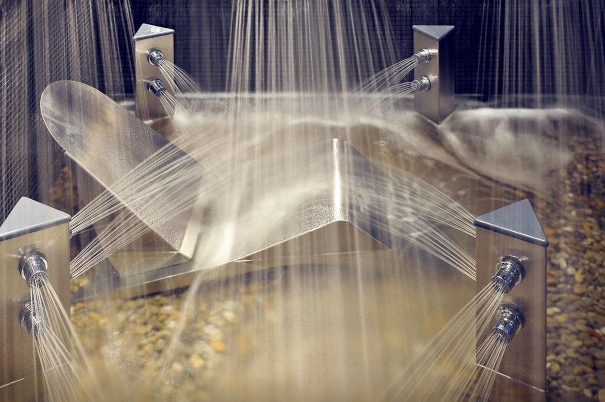 Sant Jordi Boutique Hotel Calella Esterno foto Spraying water on the surface of a rotating drum
